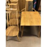 Ercol: Ercol Dining table and four blonde stick back mid century style chairs (one carver)