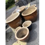 Collection of modern garden pots, eight in total