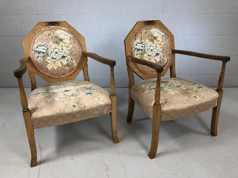 Pair of low upholstered bedroom carver chairs with floral motif (A/F)