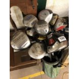 Coolection of Golf clubs, bag, two trolleys and a Golf Practice net