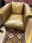 Leather club chair with matching leather cushion