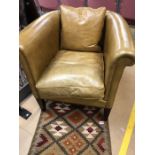 Leather club chair with matching leather cushion
