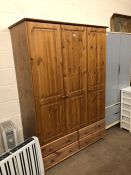 Three door pine wardrobe