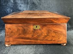 19TH CENTURY MAHOGANY RECTANGULAR SARCOPHAGUS SHAPED TEA CADDY, with three internal lidded