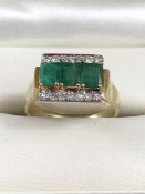 14ct Gold Emerald and Diamond Contemporary style Ring. The 3 centre Emeralds across the centre