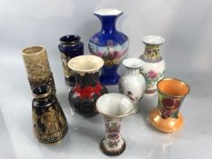 Collection of nine posy vases to include West German lava vase