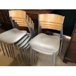 Ten metal framed chairs