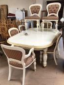 Extending painted dining room table with eight upholstered chairs (two carvers)