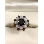 9ct gold opal and garnet halo ring