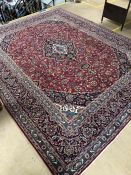 Large red ground Persian/Cashan floral medallion carpet approx. 380cm x 292cm