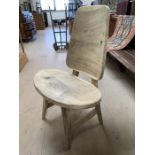 Rustic wooden chair with oval seat