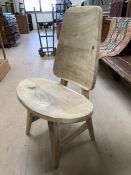 Rustic wooden chair with oval seat