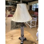 Modern ornate table lamp with cream shade