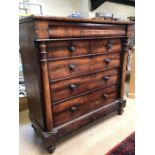 Victorian flame mahogany chest of six drawers with column detail on four bun feet