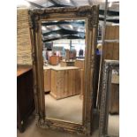 Large contemporary French-style, gold framed, bevel-edged mirror. Approx dimensions 1752mm x 889mm