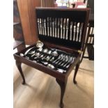 Mahogany canteen of cutlery with eight place settings on stand