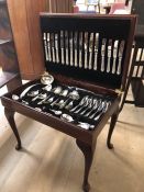 Mahogany canteen of cutlery with eight place settings on stand