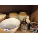 Collection of stoneware items to include large half glazed bowl and unusual stoneware colander