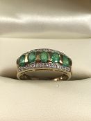 9ct gold emerald and diamond ring, approx size L.5