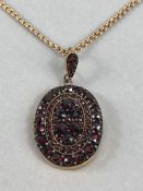 15ct Gold Chain (approx 7.8g) 49cm long with Gold coloured locket set with garnets one side a