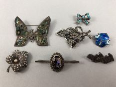Collection of Seven Silver and Silver coloured brooches Marcasite, enamel, dogs etc.