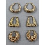 Three pairs of 9ct Gold earrings of various designs (approx 5g)