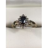 9ct gold sapphire and diamond cluster ring, approx size K.5