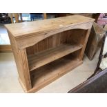 Pine bookcase with middle shelf approx 120cm x 34cm x 92cm tall