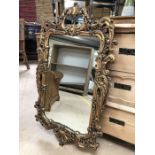 Contemporary ornate gold mirror approx 94cm x 55cm