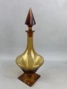 Art Deco Amber Glass Bottle with Pyramid shaped stopper and stepped Base approx 36cm tall