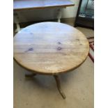 Circular pine pedestal table on tripod feet