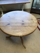 Circular pine pedestal table on tripod feet