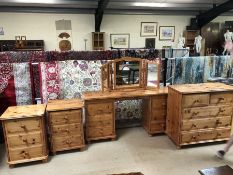 Bedroom pine suite of dressing table with mirror, chest of five drawers and two bedside cabinets