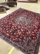 Old red ground Persian Kahsan floral pattern rug approx 299cm x 210cm