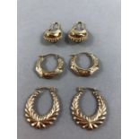 Three pairs of 9ct Gold earrings of various designs (approx 4g)