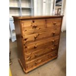 Pine bookcase and pine chest of six drawers