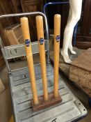 Set of wooden cricket stumps by Gunn and Moore
