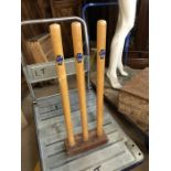 Set of wooden cricket stumps by Gunn and Moore