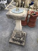 Brass and copper sundial on weathered concrete pillar approx 93cm tall