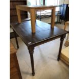 One low pine table and one dark stained table