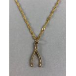 9ct Gold Chain with 9ct Gold wishbone pendant (375) approx 4.5g