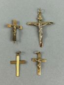 Four 9ct Gold crucifix pendants (approx 3.9g)