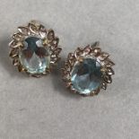 Pair of 375 9ct Gold earrings set with Pale Blue Stones