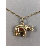 9ct Gold hallmarked chain with Gold coloured elephant pendant (approx 4.1g)