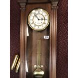 Reproduction Vienna mahogany cased two train wall clock, the dial inscribed `James Stewart,