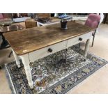 Rustic pine kitchen table with two drawers, painted legs and castors