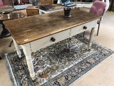 Rustic pine kitchen table with two drawers, painted legs and castors