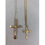 Two 9ct gold chains both with Gold crosses (one hollow) approx 4.7g