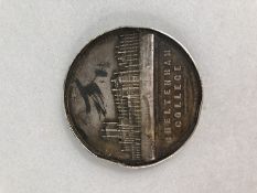 Medal: Cheltenham College Silver medal dated 1883 inscribed to the edge "Walter Gorst Clay"