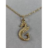 9ct Gold chain 375 approx 56cm long with a 9ct 375 seahorse pendant (total weight approx 3.1g)